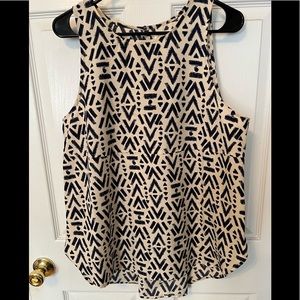 Navy and cream sleeveless swing top